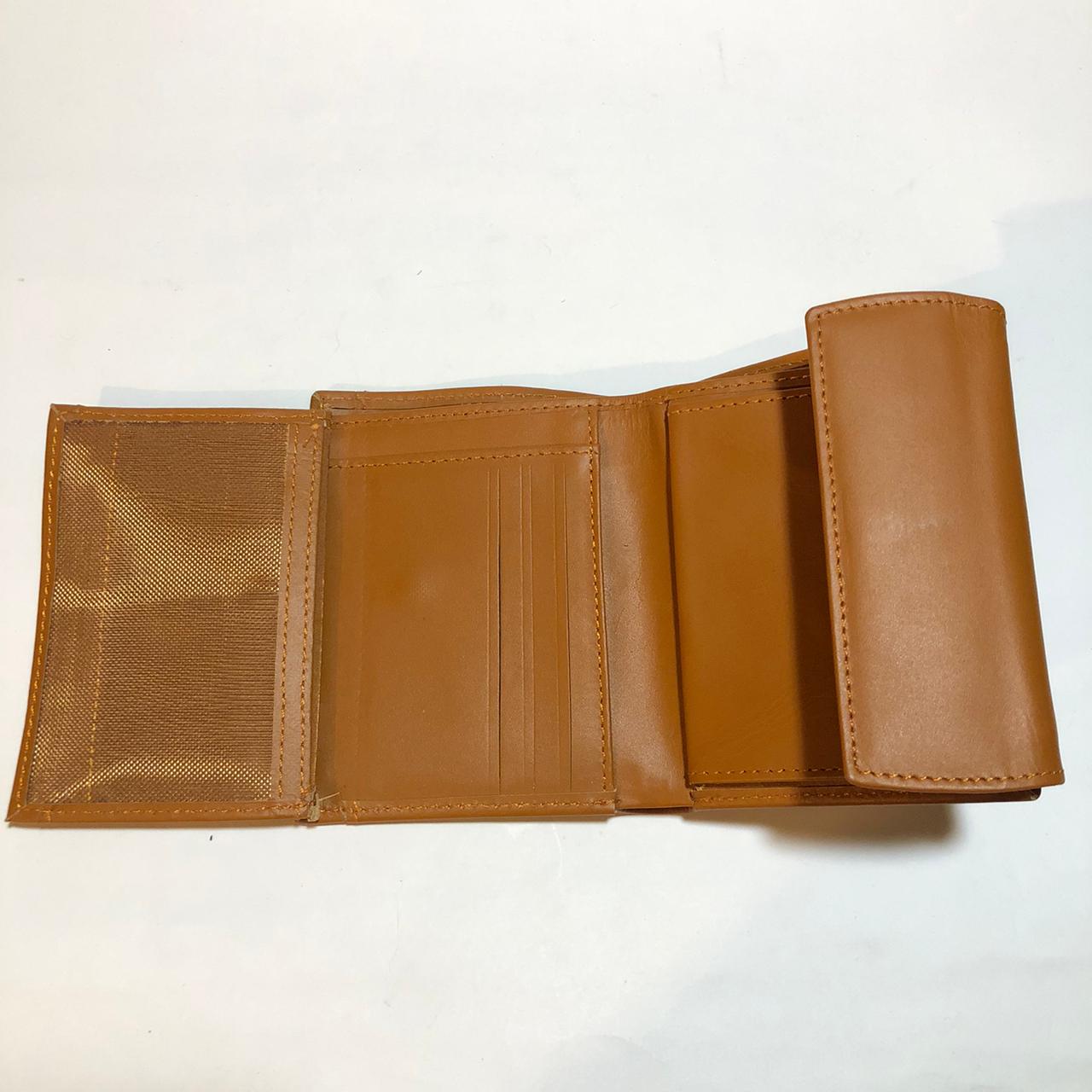 Tan leather trifold wallet