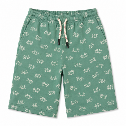 Green shorts with white pattern on a white background